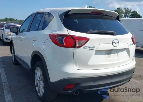 2015 Mazda Cx-5 Grand Touring z USA, uszkodzony, nr VIN JM3KE4DY9F0490276